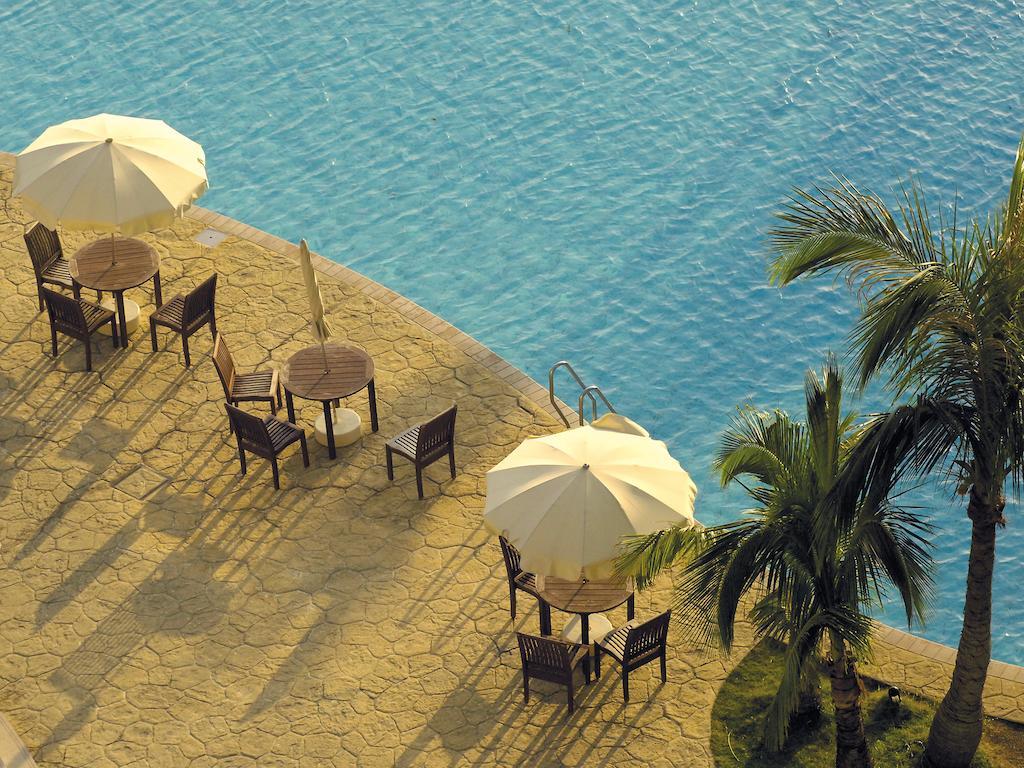 فندق نيكو أليفيلا يوميتان المظهر الخارجي الصورة The pool at the Taj Bengal
