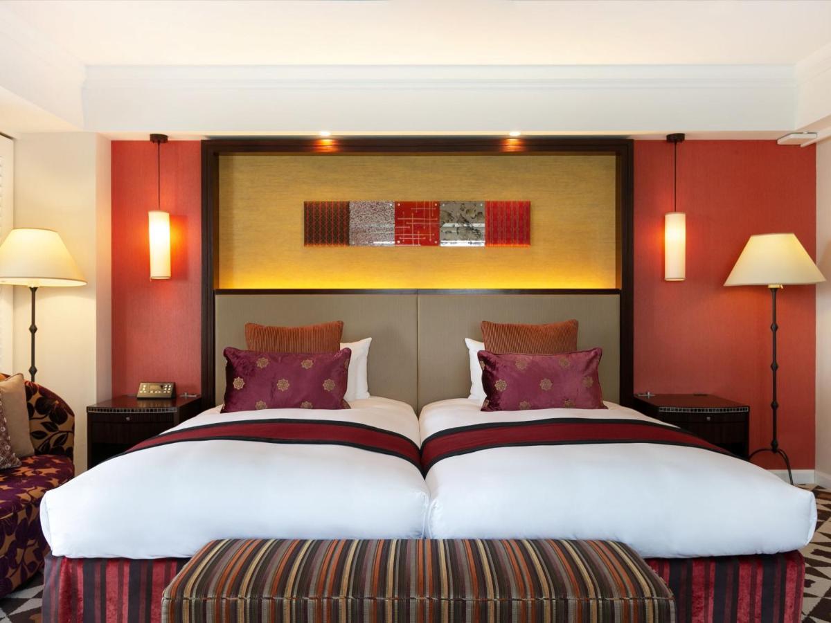 فندق نيكو أليفيلا يوميتان المظهر الخارجي الصورة A bedroom at the hotel